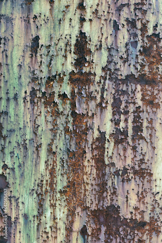 Rusty metal, peeling paint on a sheet of metal, texture, background. photo