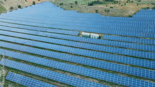 Aerial shot of cco power Save Earth solar power plant, esg investing photo