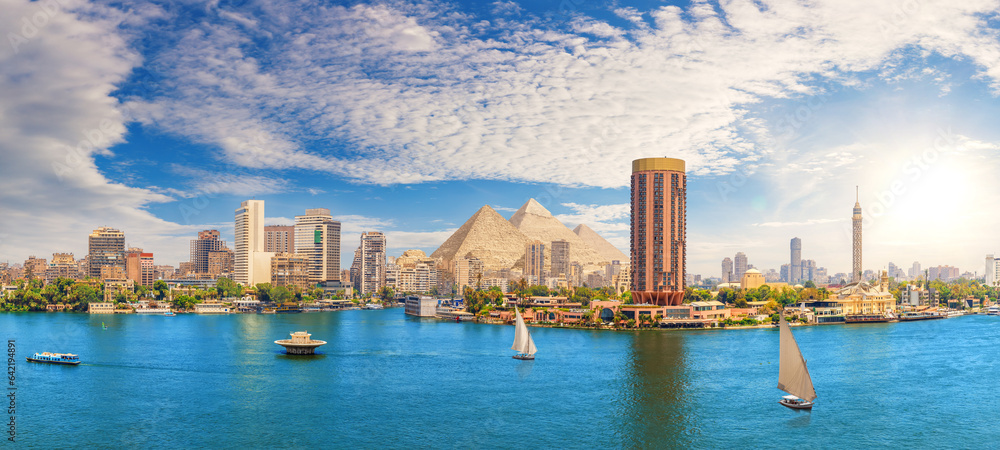 View on the Nile, Cairo city and famous Pyramids in the beautiful panorama of Egypt