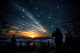 Silhouette of photographer with camera against starry night sky