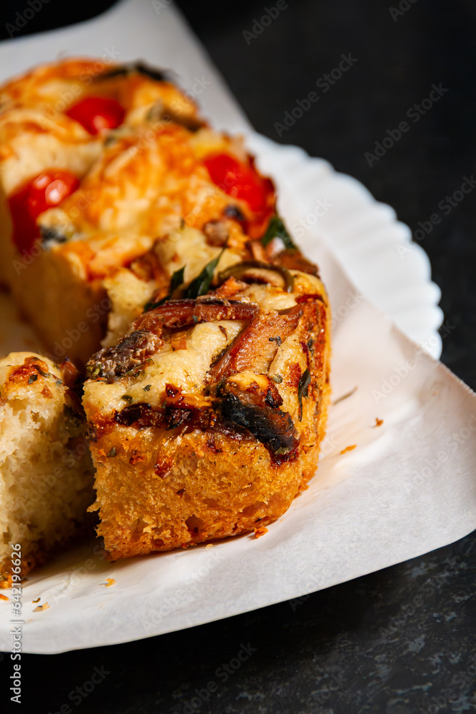 Baked Focaccia with tomatoes and rosemary Baked Focaccia with tomatoes and rosemary