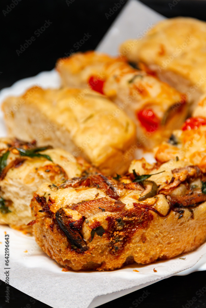 Baked Focaccia with tomatoes and rosemary