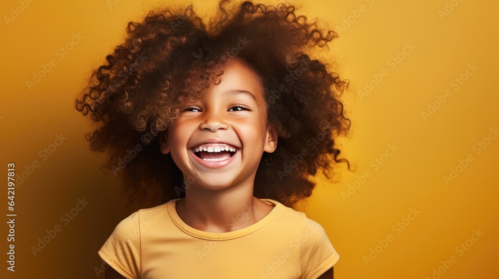 beautiful African American girl with an infectious smile that warms the heart. This touching image is in high demand for marketing campaigns and children's publications. beautiful African American girl with an infectious smile that warms the heart. This touching image is in high demand for marketing campaigns and children's publications.