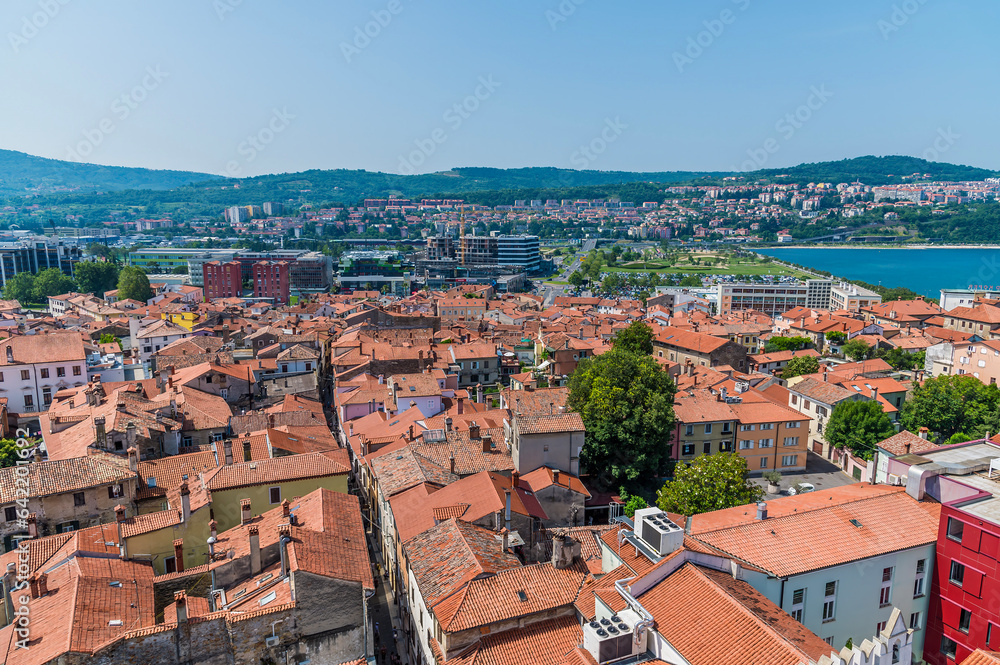A view west from the clock tower above Tito Square over the rooftops of Koper, Slovenia in summertime
