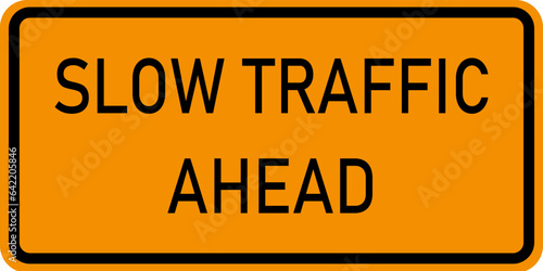 Vector graphic of a USA slow traffic ahead highway sign. It consists of the wording slow traffic ahead within a black and orange rectangle