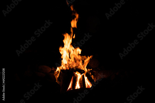 bright orange fire flames on a black background