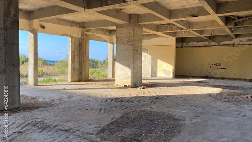 Large hall with panoramic windows is unfinished construction