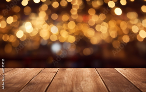 The empty wooden table top with blur bokeh background © Harry