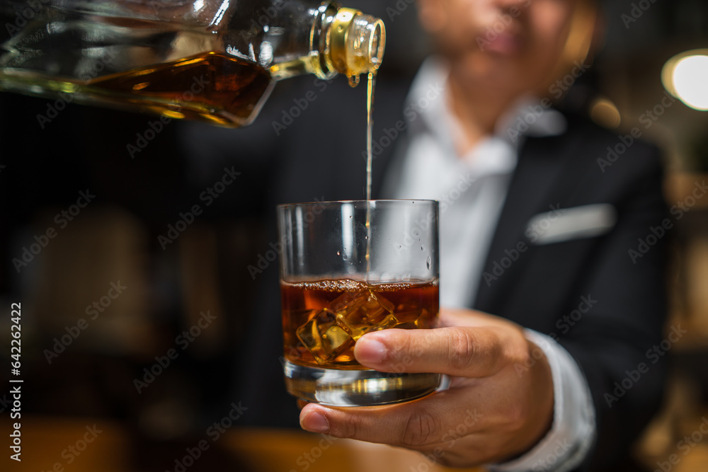 Businessmen in suits drinking whiskey Businessmen in suits drinking whiskey