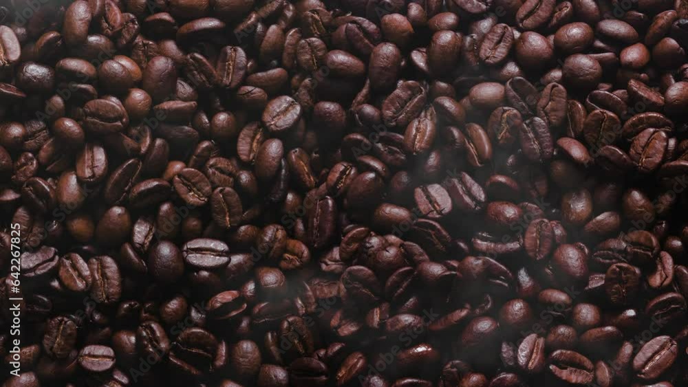 coffee beans with smoke seen up close coffee beans with smoke seen up close