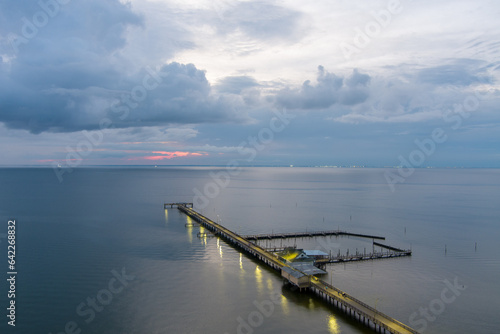Aerial view of the Fairhope Pier at sunset