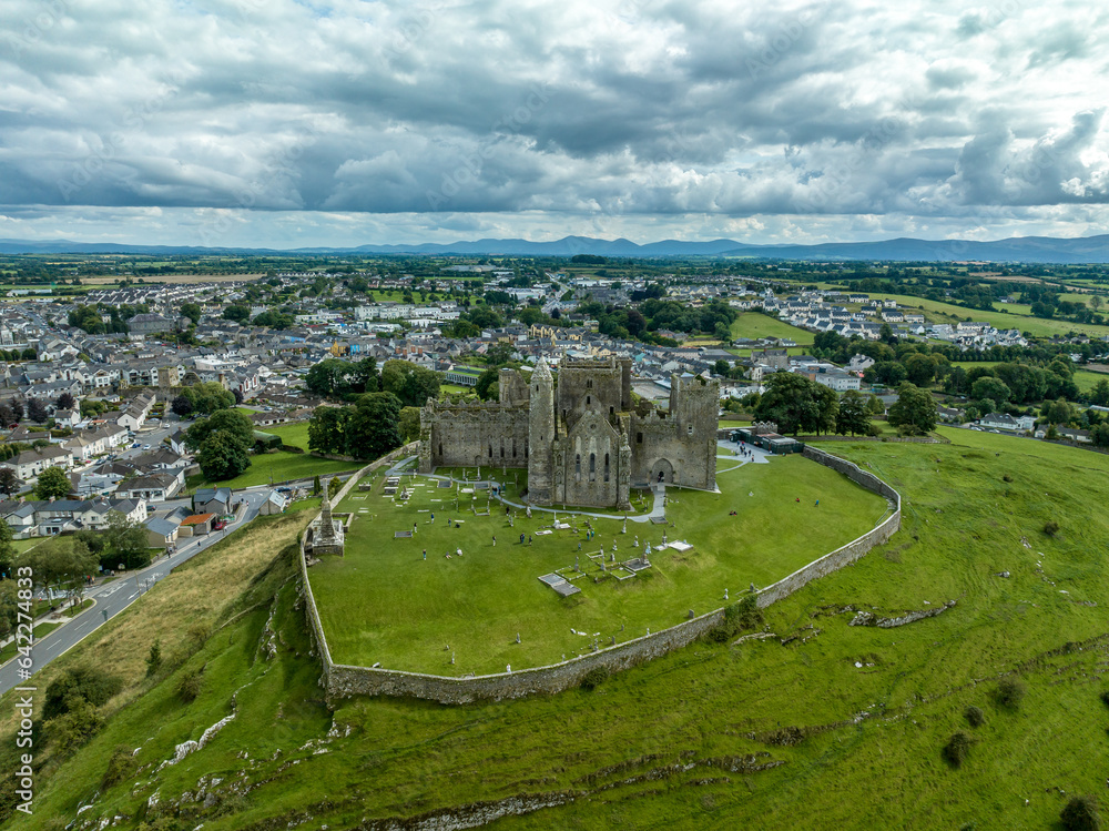Aerial view of Rock of Cashel iconic Irish historic landmark with Romanesque chapel, a Gothic cathedral, an abbey, the Hall of the Vicars Choral and a fifteenth-century Tower House