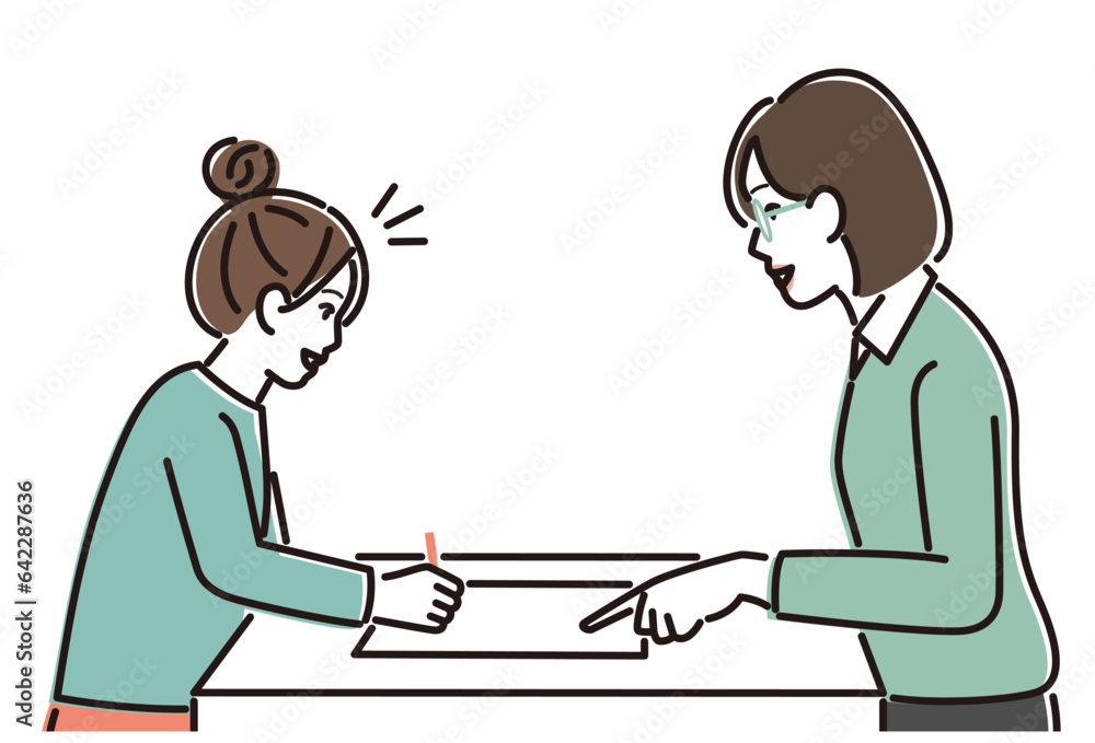 個別指導される生徒と先生 個別指導される生徒と先生