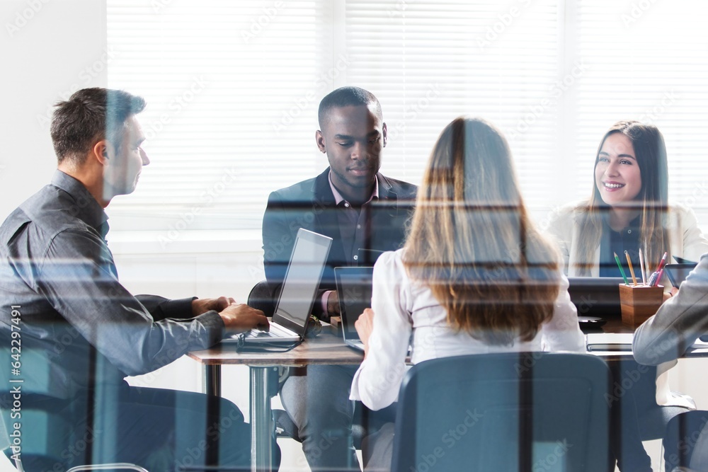 © Andrey Popov - Businesspeople In Meeting © Andrey Popov - Businesspeople In Meeting