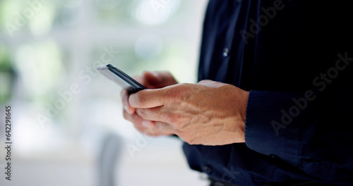 Older Man With Mobile Phone Or Smartphone