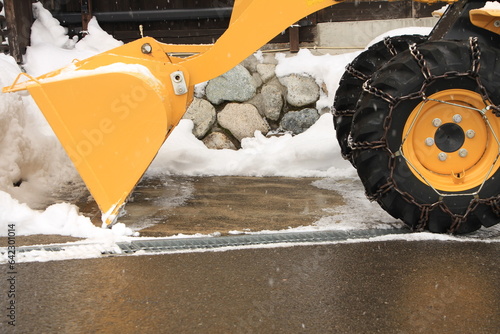 Vászonkép Snowplow Used in Shirakawa-go Village in Japan During Snowy Winter