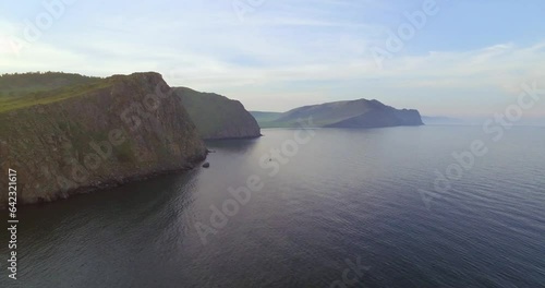 Baikal lake, cliffs, steep banks. Nice highland landscapes filmed from the sky. photo