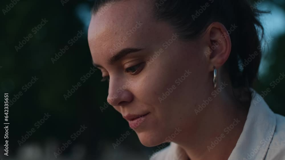 Portrait of smiling woman. Close-up view of beautiful dreamy girl in profile looking out at sunset, natural beauty concept. Slow motion 4K Portrait of smiling woman. Close-up view of beautiful dreamy girl in profile looking out at sunset, natural beauty concept. Slow motion 4K