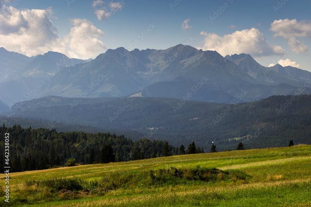 The Tatra Mountains seen from the Spiš region in Poland during a summer day.