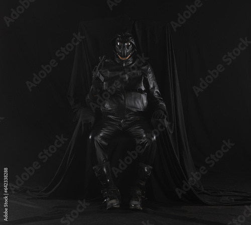 portrait of a futuristic soldier in a mask on a black background