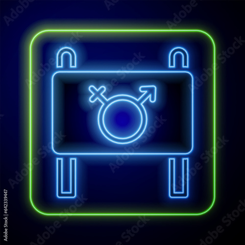 Glowing neon Female movement, feminist activist with banner and placards icon isolated on blue background. Feminist rights movement, feminism sisterhood. Vector