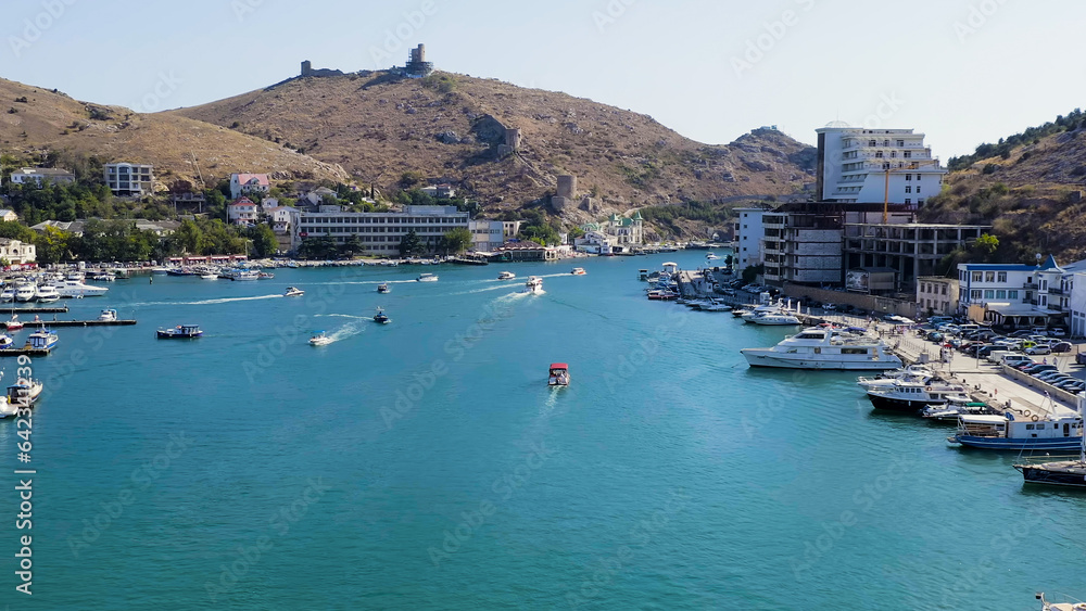 Sevastopol, Crimea - September 12, 2020: Balaklava Bay with yachts and pleasure boats, Aerial View