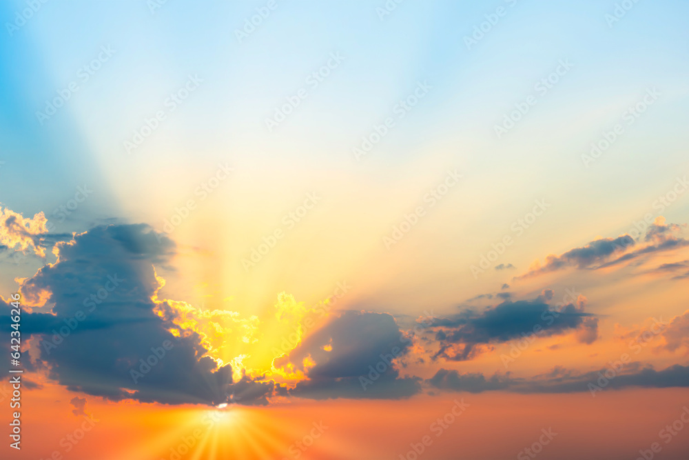 Obraz premium Sunset sky dramatic sunset clouds and sunset sunrays