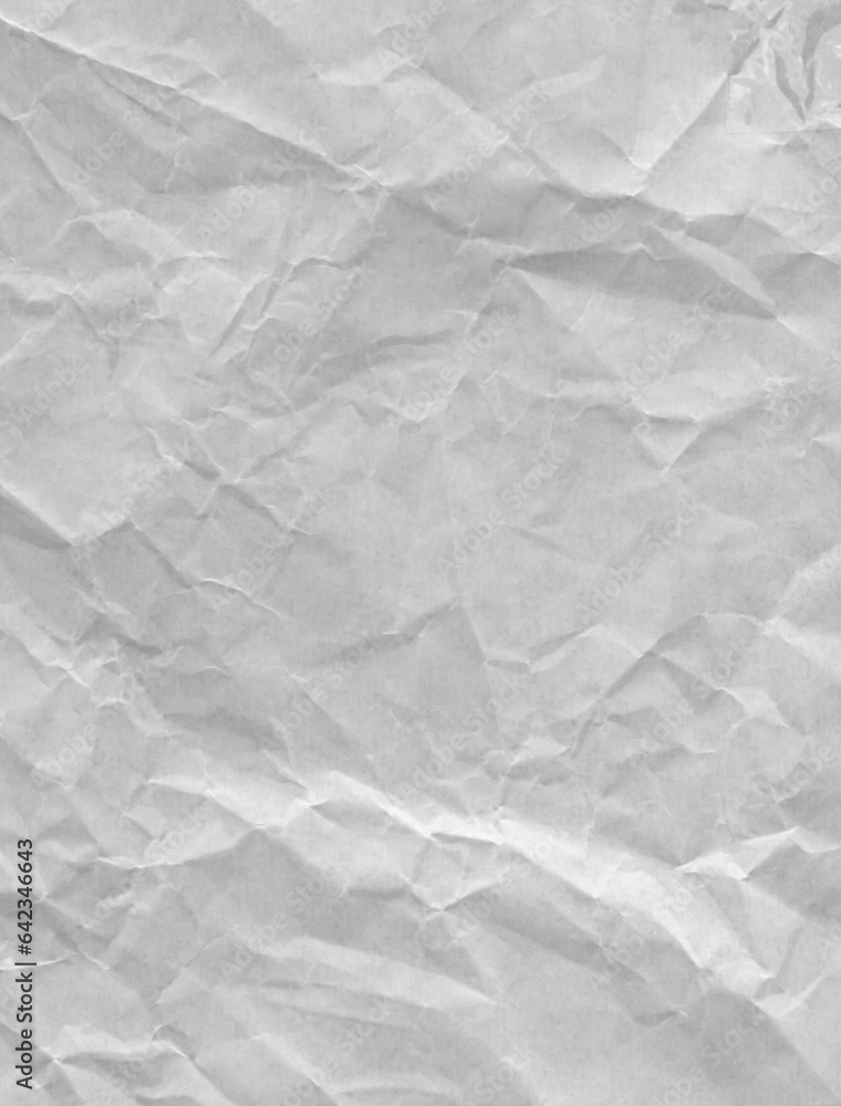 Fototapeta premium A crumpled and wrinkled white paper texture. vertical image