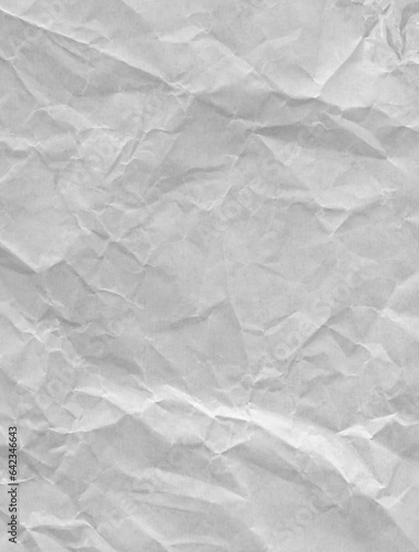 A crumpled and wrinkled white paper texture. vertical image