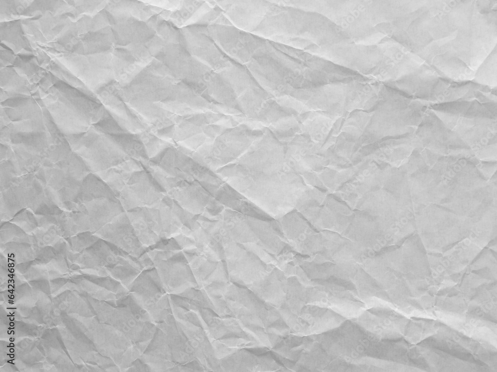 Naklejka premium Crumpled and wrinkled white paper surface. Horizontal image