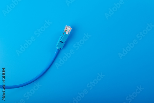 ethernet cable, digital communication, wired connection, blue background photo