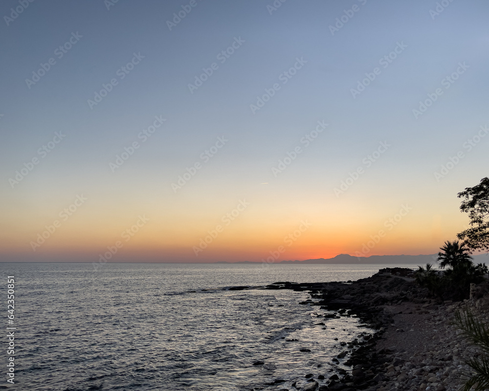 Obraz premium sunset on the beach Mediterranean Sea