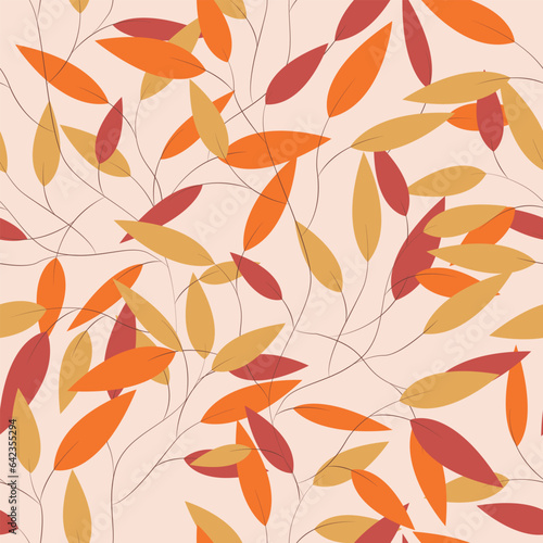 Autumn seamless pattern of yellow, orange and red leaves on a soft brown background