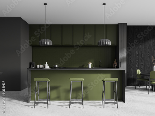 Gray and green kitchen interior with bar