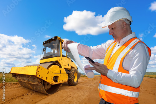 Man is road builder.Asphalt...