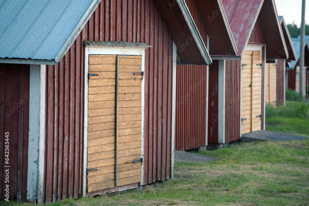 Fototapeta premium Fishing sheds on the coast