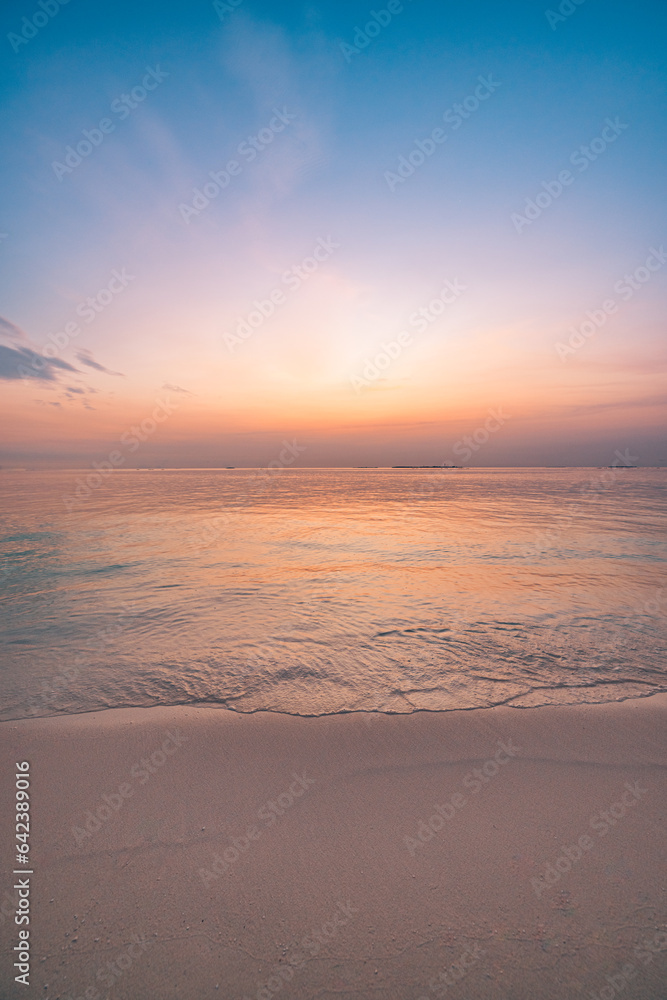Closeup sea waves sand beach. Panoramic coast landscape. Inspire tropical seascape horizon. Orange gold sunset sky. Peaceful calm tranquil relax sunlight summer background. Vacation travel wallpaper