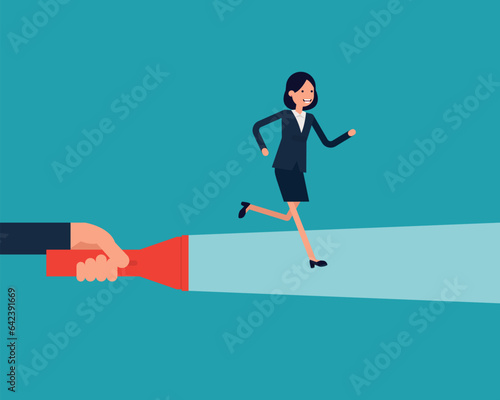 A businessman running on flashlight by big hand