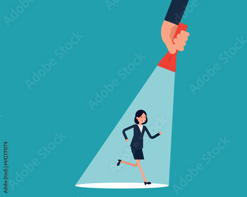 A businessman running on flashlight by hand