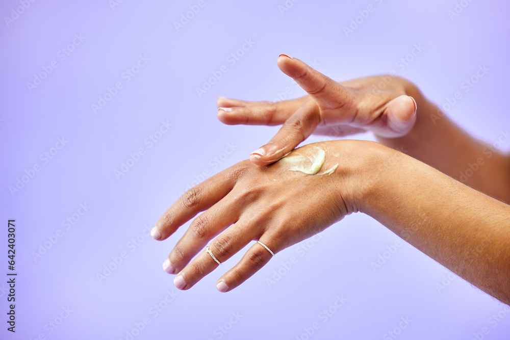 Hands, dry skin and woman with cream for studio skincare, cosmetics or wellness on purple background. Bodycare, beauty or lady model with lotion, dermatology or eczema, acne or treatment application