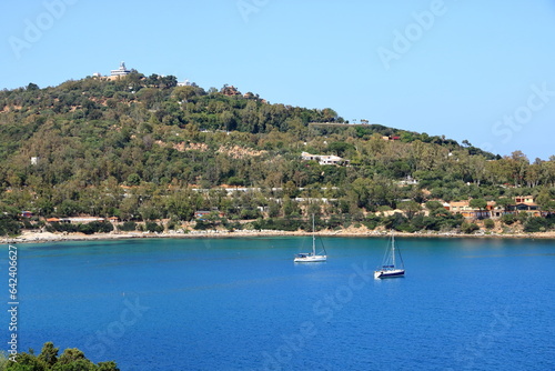 view from the San Gemiliano tower on the rocky coast on the blue sea. Sardinia, Italy. City of Arbatax photo