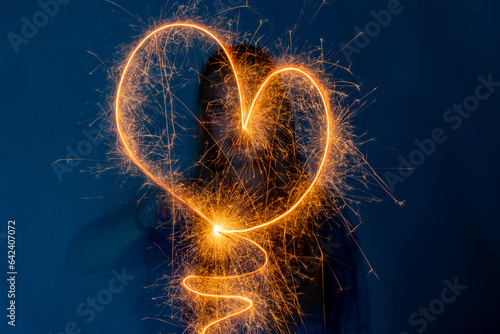 painting with light in long exposure with message of love