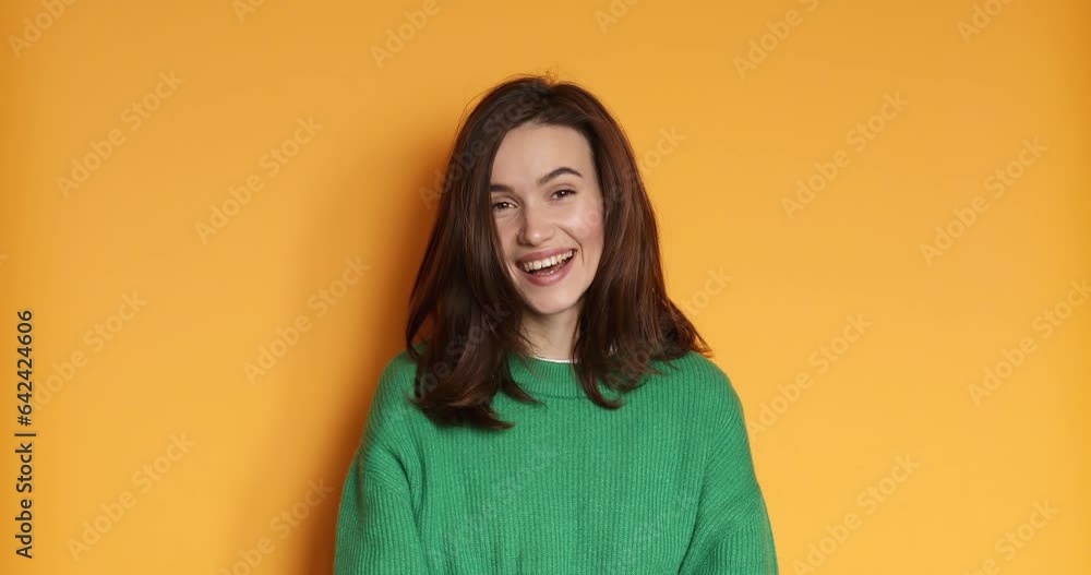 Come to me, I want to embrace you. Stylish woman spread hands. Pleasant expression, love feelings. Young woman on yellow studio background. You come to me, come here, calling beckoning, coming closer. Come to me, I want to embrace you. Stylish woman spread hands. Pleasant expression, love feelings. Young woman on yellow studio background. You come to me, come here, calling beckoning, coming closer.