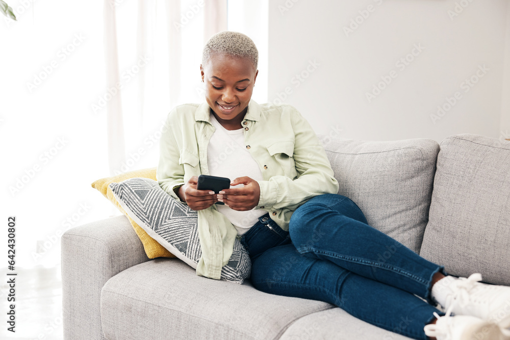Happy black woman, smartphone and typing on sofa for social media post, digital contact and reading notification. Cellphone, mobile games and scroll online shopping app to search subscription at home Happy black woman, smartphone and typing on sofa for social media post, digital contact and reading notification. Cellphone, mobile games and scroll online shopping app to search subscription at home
