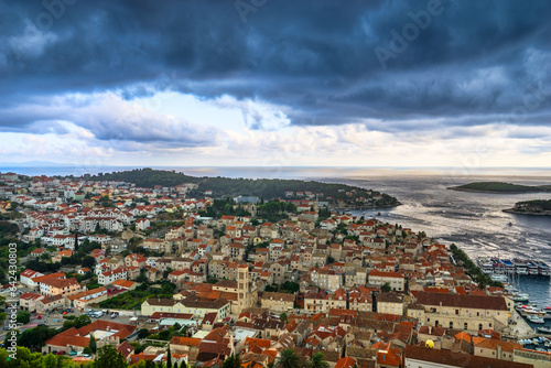 Skyline panorama of Hvar coast town at sunset. Croatia