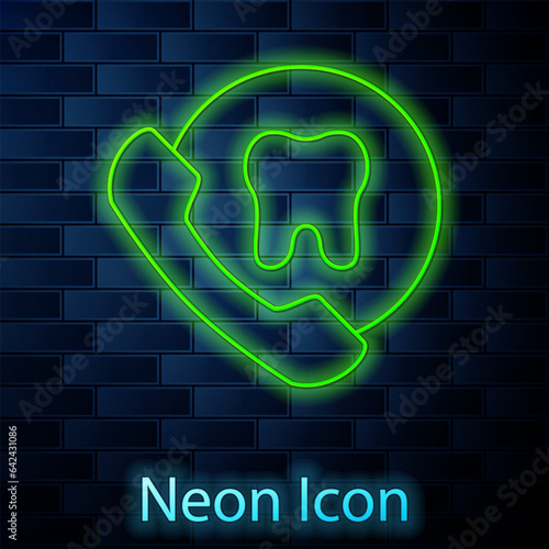 Glowing neon line Online dental care icon isolated on brick wall background. Dental service information call center. Vector