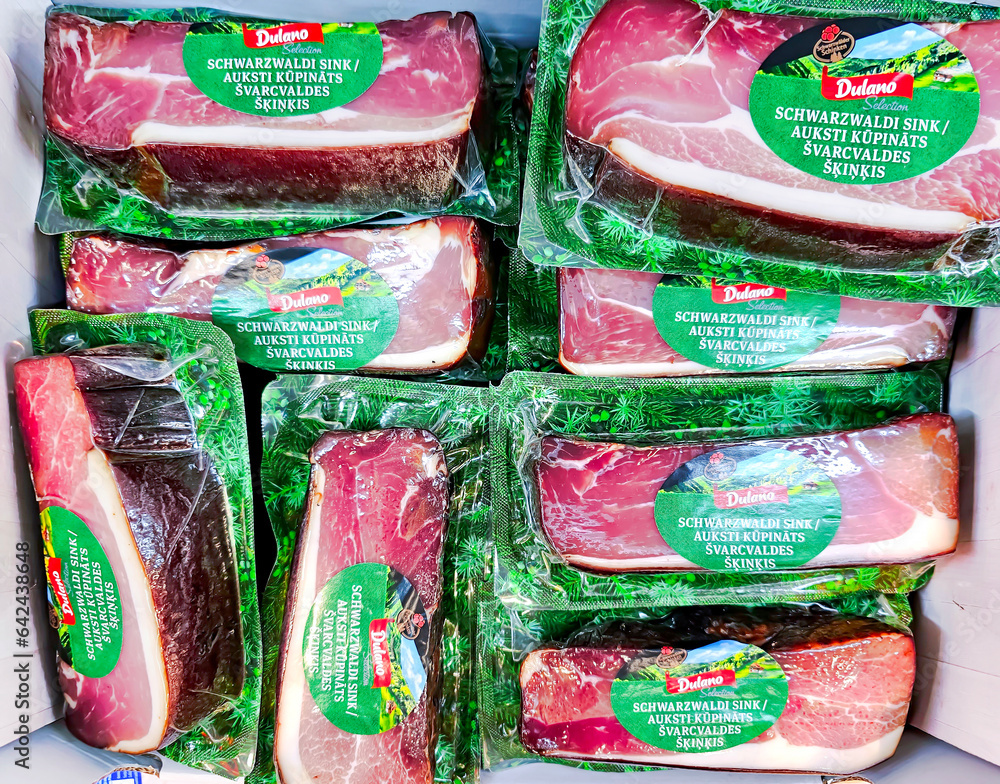 LATVIA, RIGA, 30, AUGUST, 2023 Vacuumpacked smoked pork bacon with