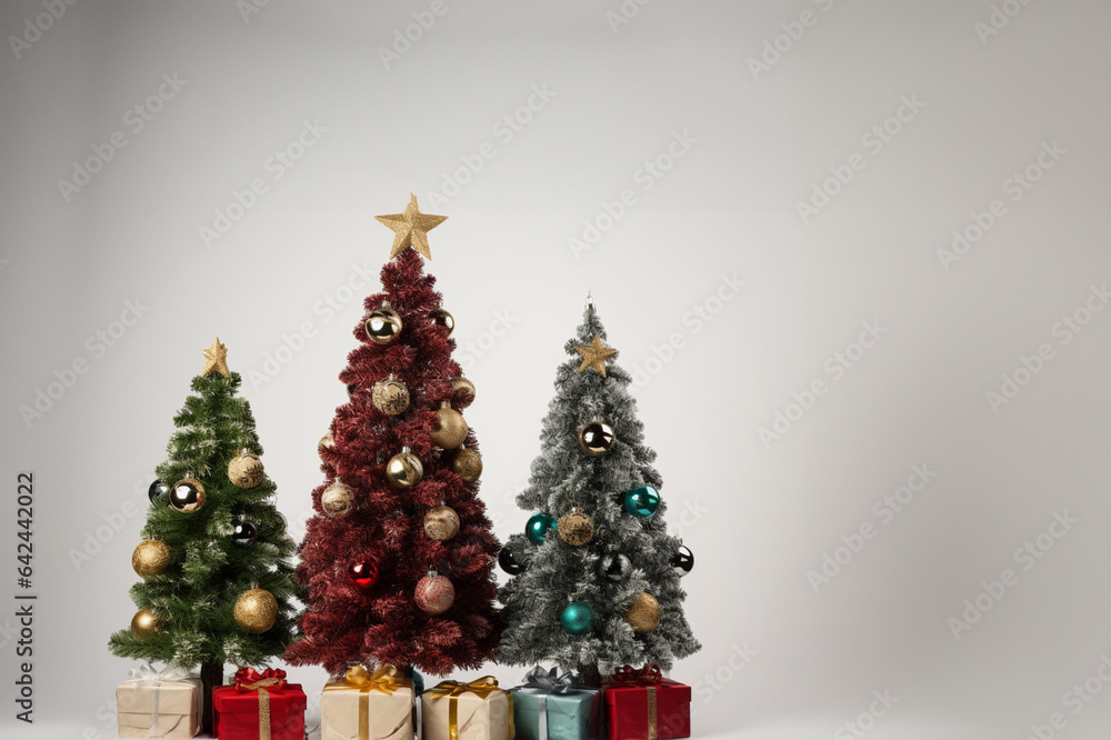 Christmas tree with presents in front of grey background. 3d rendering Christmas tree with presents in front of grey background. 3d rendering