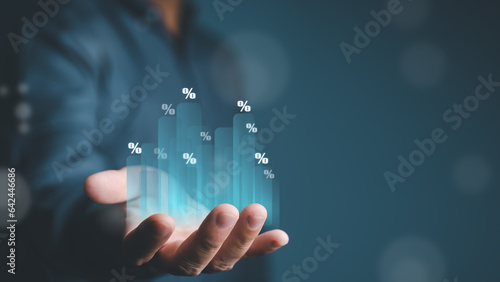 Business strategy concept. Businessman Investor, or Trader analyzing sales data and economic bar graph chart with percentage symbols for stock investments, business growth profit. Digital marketin photo