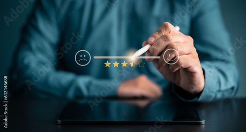 Customer satisfaction survey concept. Client drags scroll bar for rated service 5 star product satisfaction experience. Review of the quality of services leading to business reputation ranking score. photo